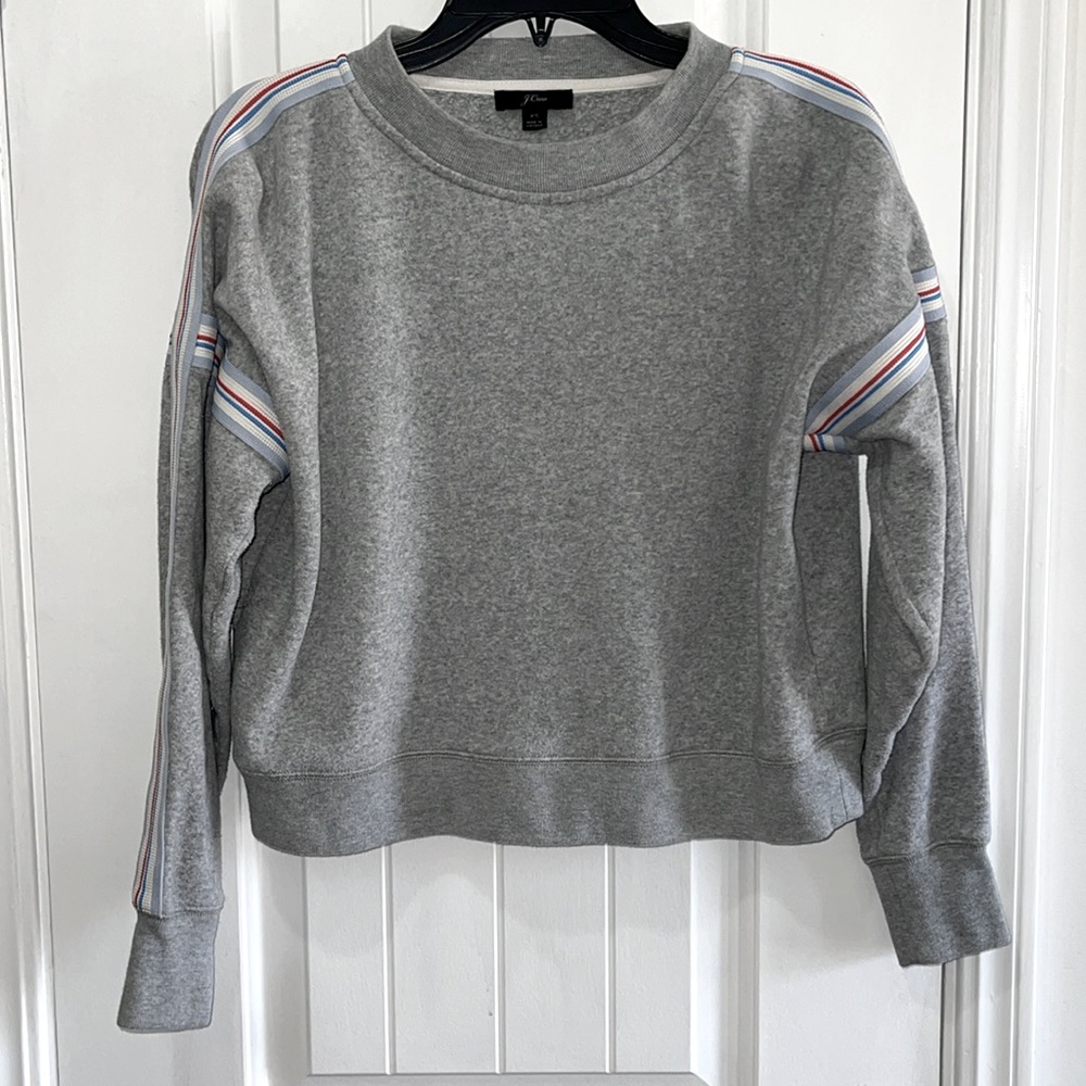 J. Crew Gray long sleeve sweatshirt with red white and blue stripes on sleeves
